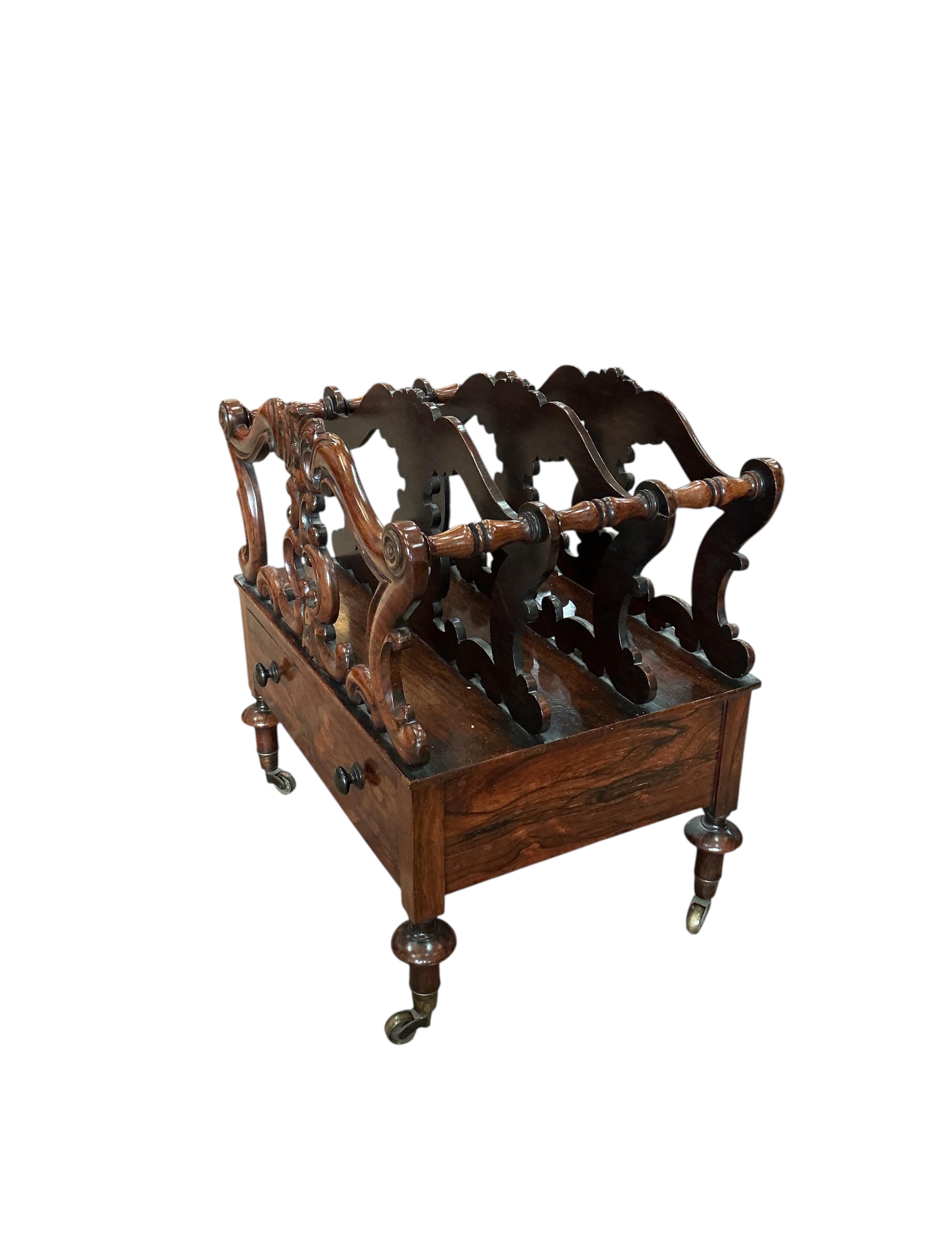 A Victorian rosewood three division Canterbury, width 56cm, depth 41cm, height 58cm